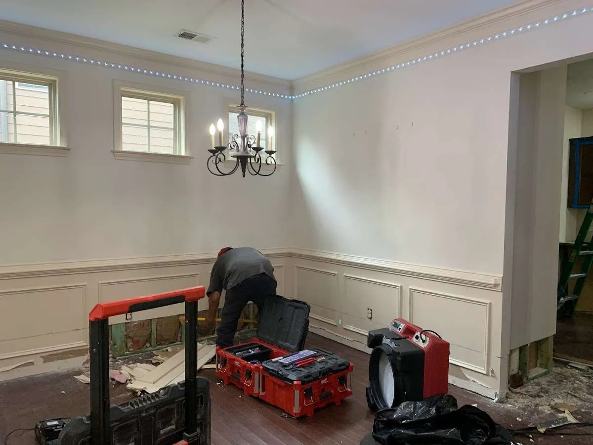 Restoration technician with professional equipment in Tampa